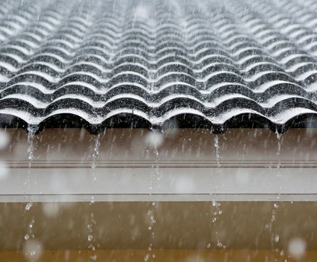 Rain Running Off Metal Roof