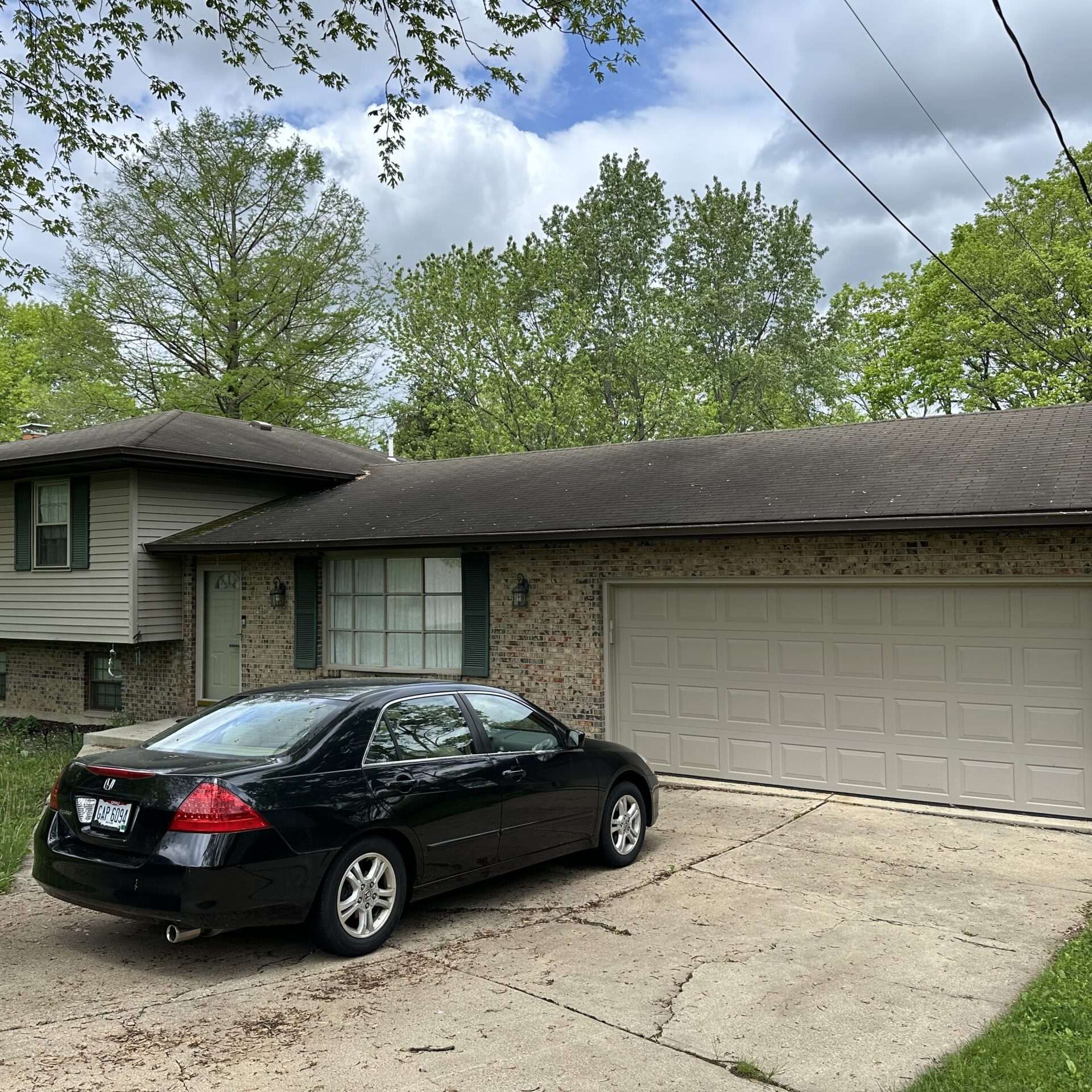 Full house before photo of a prospective roof replacement home in Fairfield, OH by Weather Stop Roofing