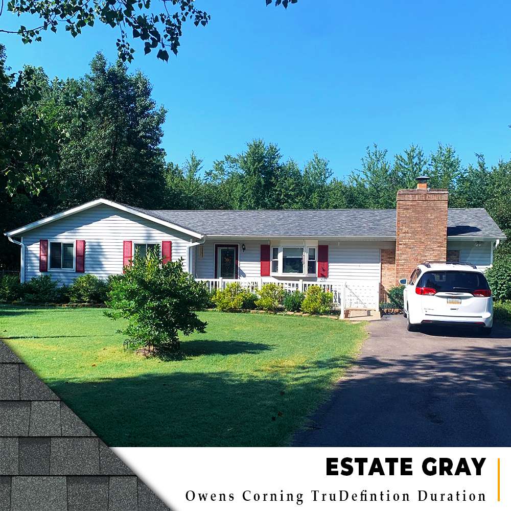 Estate Gray Owens Corning shingle roof replacement on white siding ranch in Fayetteville, Ohio.