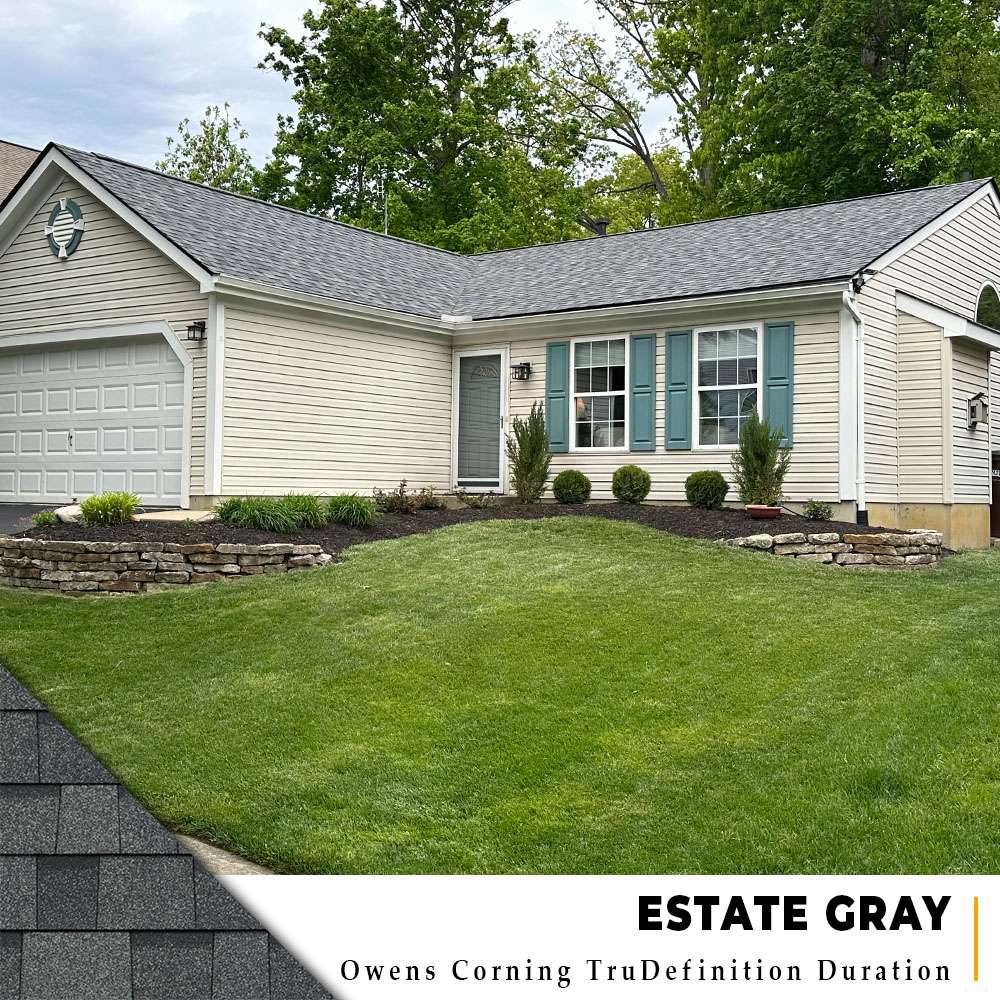 New roof with Estate Gray dimensional shingles on a one-story ranch with off-white siding home in Loveland, Ohio.