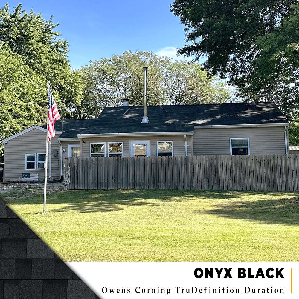 New Onyx Black Owens Corning roof on a tan siding home in Goshen, Ohio.